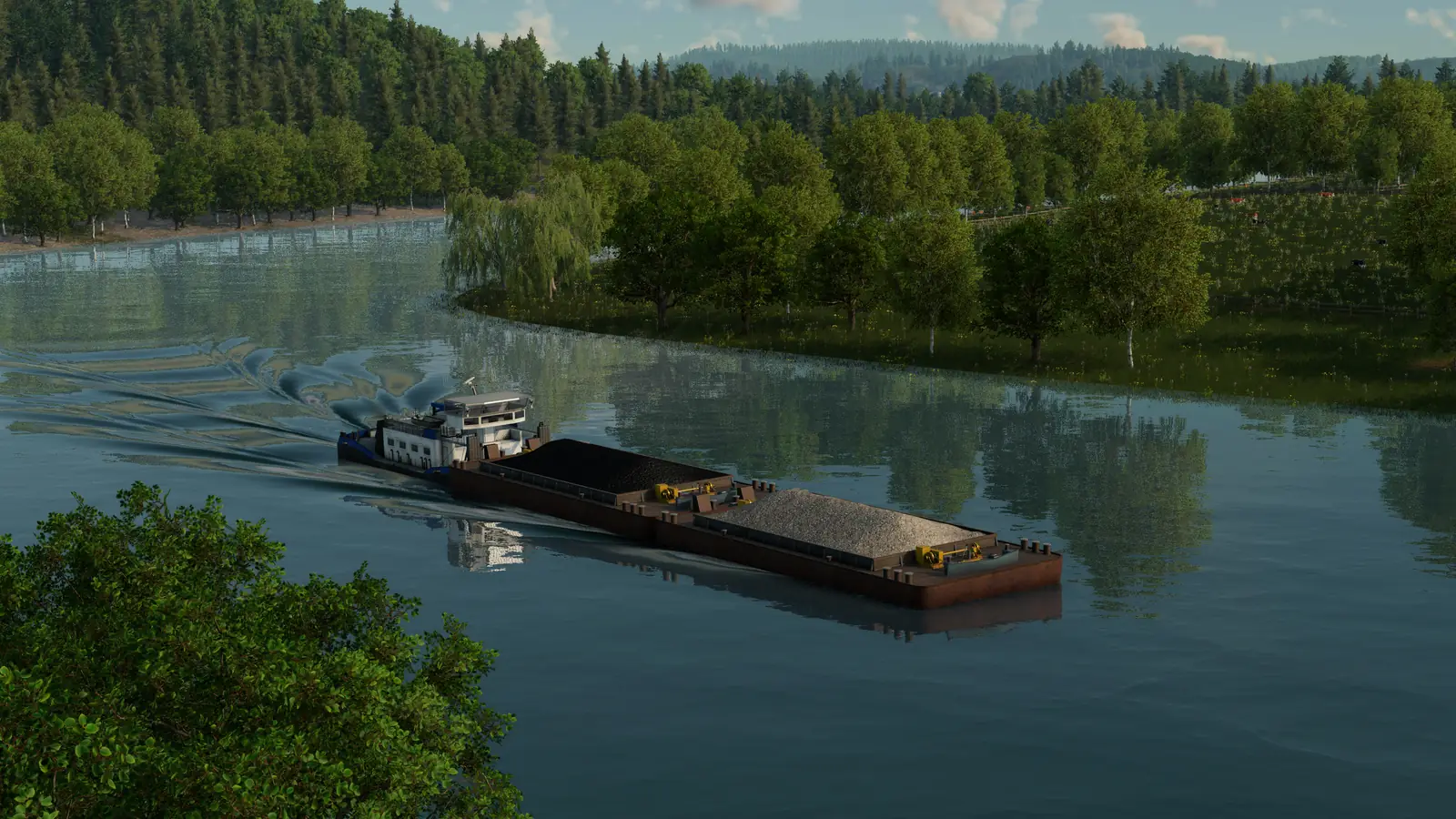 A cargo barge loaded with bulk goods sailing down a forested river in Transport Fever 3